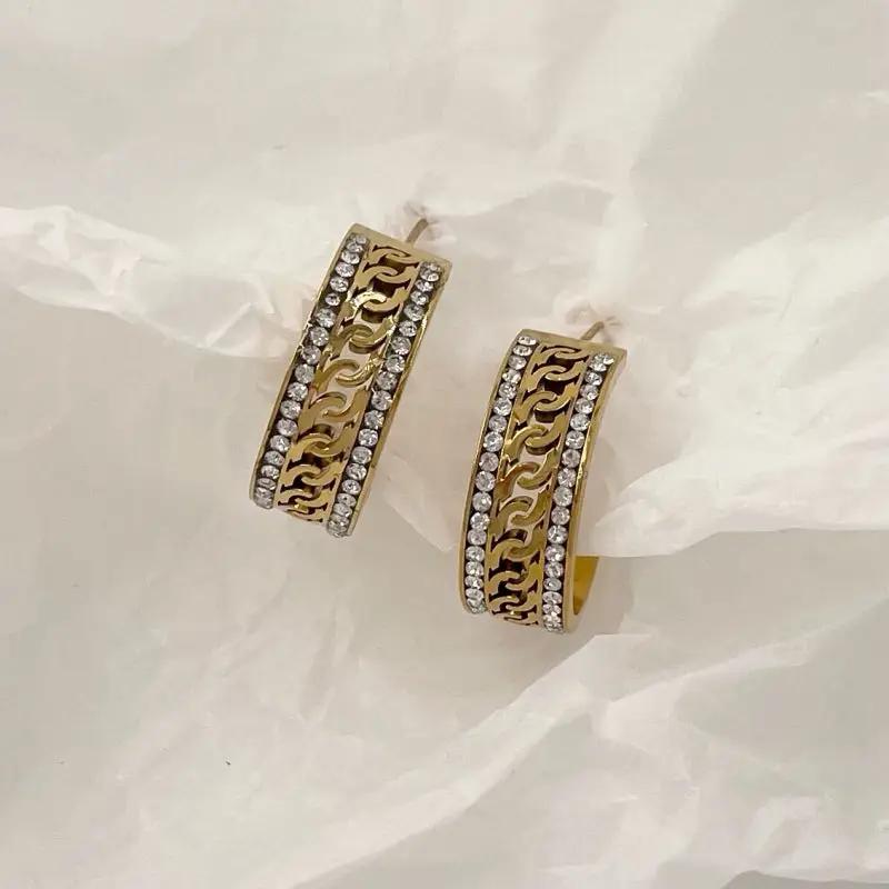 fancy earrings with diamond line